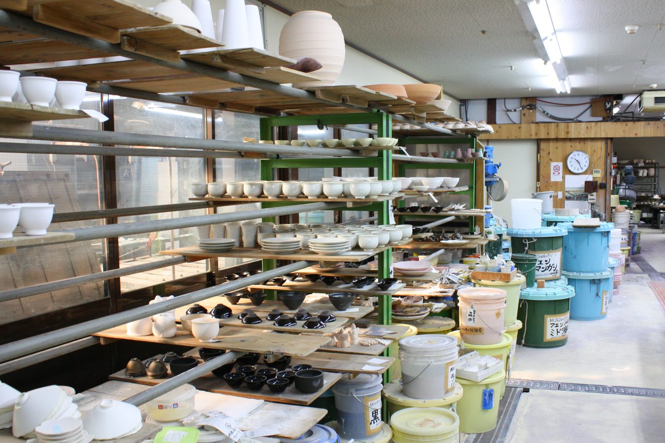 Shelves of pieces in the Touan workshop
