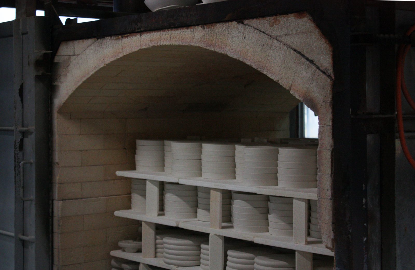 Plates stacked inside the kiln